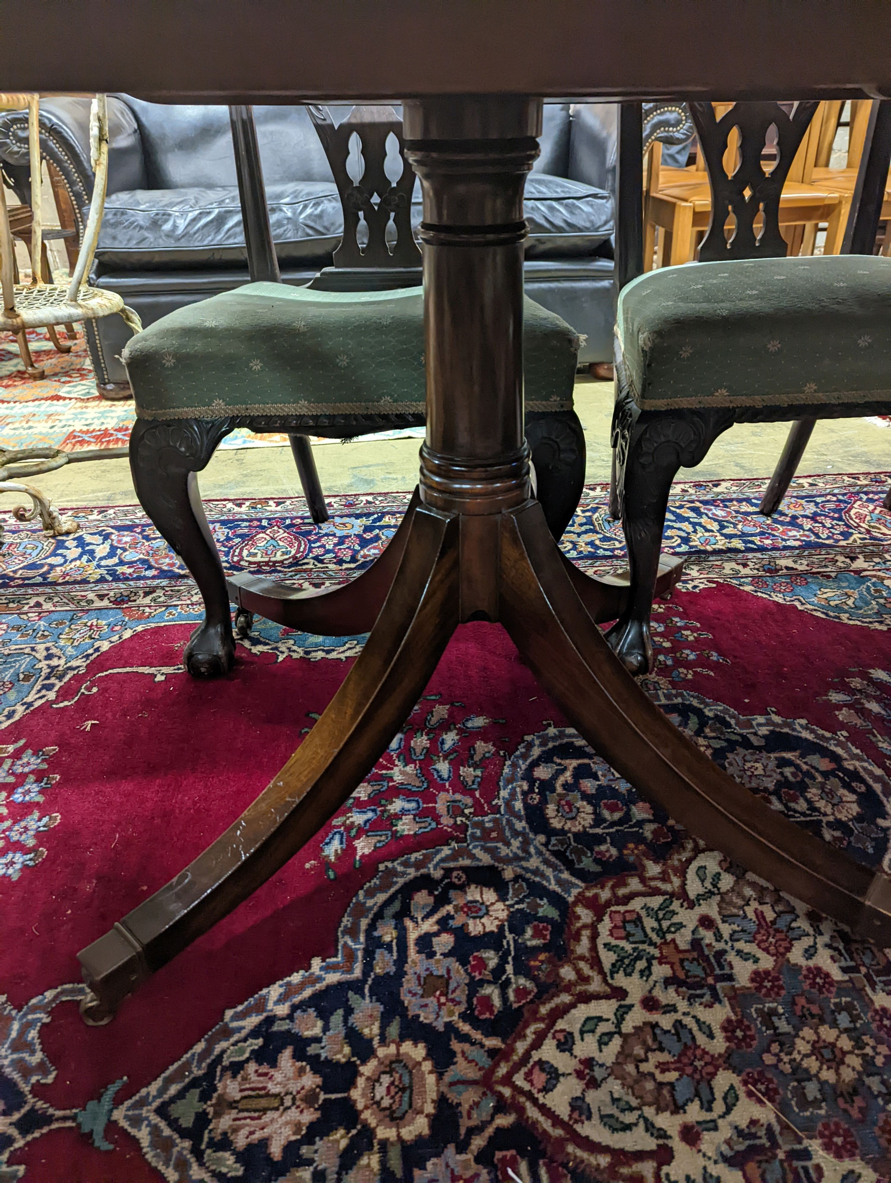 A reproduction George III style rectangular mahogany extending dining table, 241cm extended, one spare leaf, depth 104cm, height 74cm